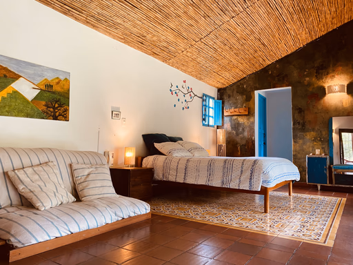Habitación La Cumbre con cama doble y futón